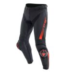 Crafted from premium D-Skin cowhide leather, the Dainese Super Speed motorcycle pants are built for riders who crave sporty performance on the road. Designed to pair seamlessly with the Super Speed 4 jacket, these pants deliver a perfect combination of protection, comfort, and track-inspired style. The robust leather construction is enhanced with S1 stretch fabric and elasticated inserts, ensuring a close, ergonomic fit without compromising mobility. This design allows for dynamic movement while maintaining high levels of safety, ideal for aggressive street riding. Drawing on technology from MotoGP™ gear, the Super Speed pants feature advanced knee sliders with a lighter construction for improved feel. Thanks to the Replaceable Slider System (RSS), these sliders can be easily replaced and adjusted without repositioning the Velcro, allowing riders to tailor protection to their specific riding style. Certified composite protectors at the knees and soft Pro-Shape 2.0 protectors at the hips provide superior impact absorption while maintaining a slim, comfortable profile. For added functionality, a zipper at the calf and Velcro fastenings at the hem ensure compatibility with Dainese “IN” boots. A dedicated jacket-to-pants zipper offers a secure connection for a complete, race-ready outfit. Breathable mesh lining promotes airflow, making the Super Speed pants suitable for high-temperature riding and summer outings. Combining race-level protection with real-world comfort, these pants are an essential choice for riders who push their performance on the road.