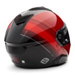 MODULAR HELMET WITH RETRACTABLE SUN SHIELD AND AERODYNAMIC SPOILER