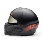 MOTORCYCLE HELMET WITH MOISTURE‑WICKING LINER, SPEAKER POCKETS AND UV‑PROTECTED SHIELD